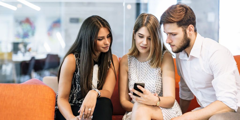 people looking at phone