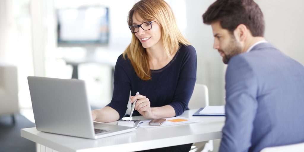 people looking at computer